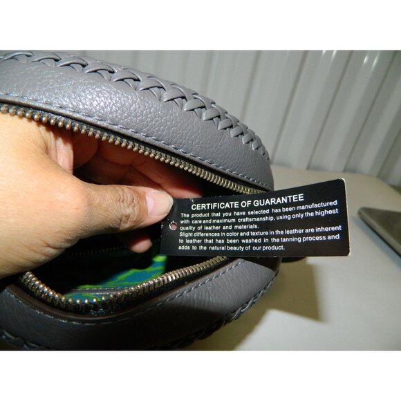 Oryany Kaye Round Whip Stitch Pebbled Leather Crossbody Bag Tassel & Adj Strap - Picture 16 of 16